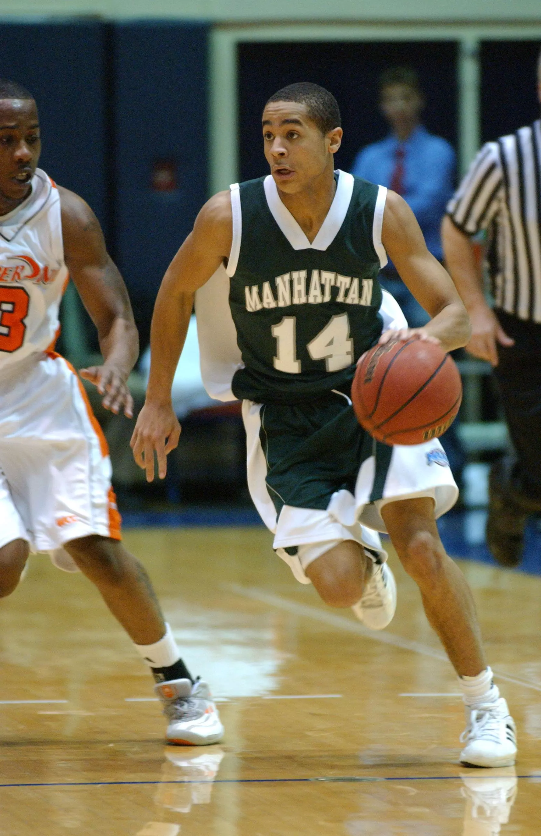 MEN'S BASKETBALL USES PRESSURE TO DEFEAT PRINCETON, 71-65