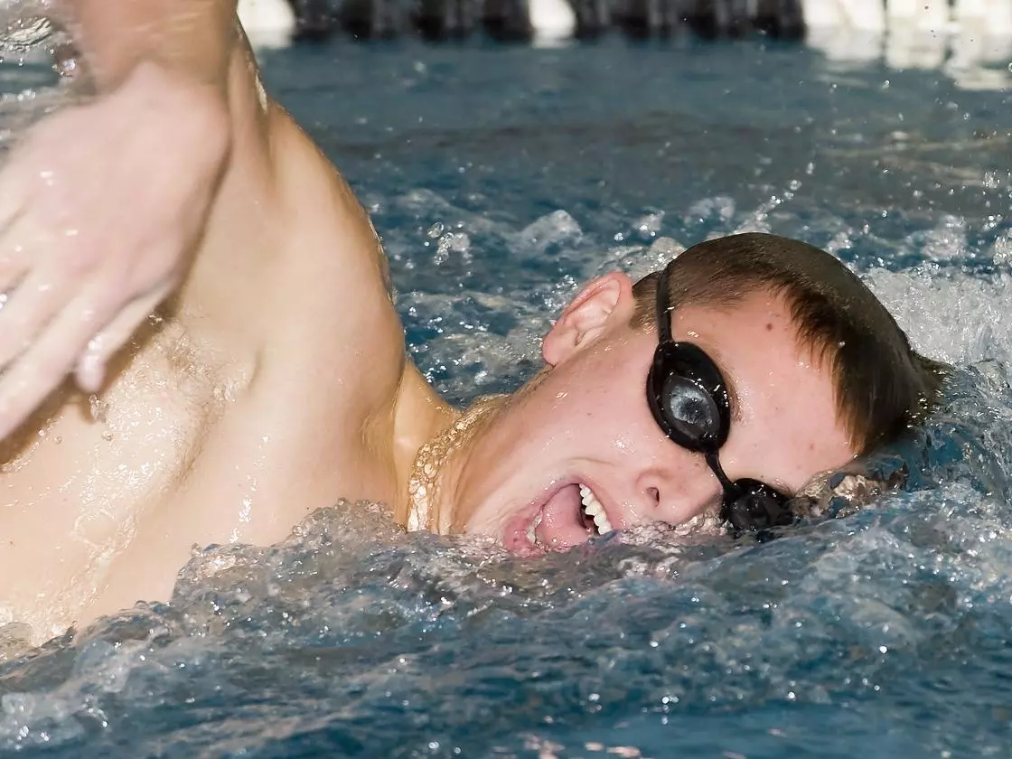 Manhattan Dominates In Season Opening Meets