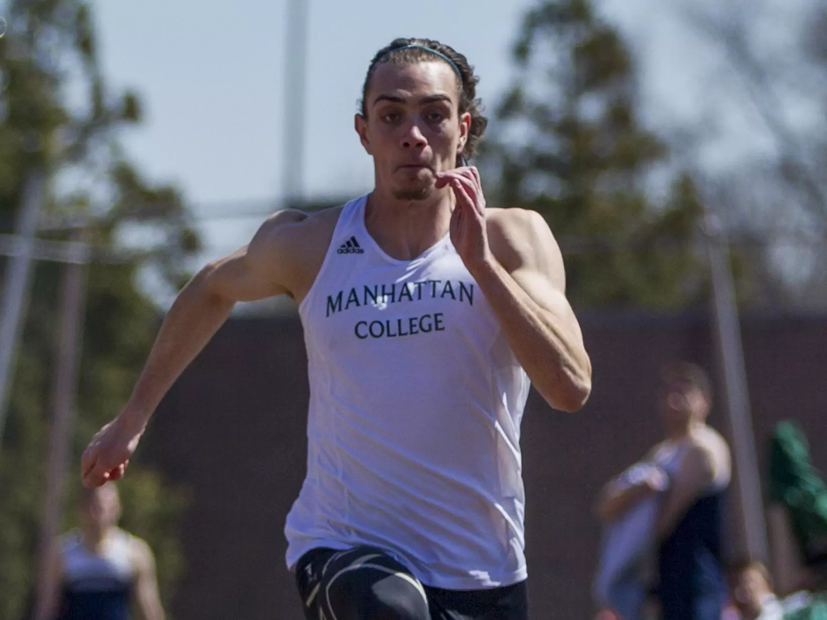 Clarke Wins Long Jump at Spec Towns Invitational