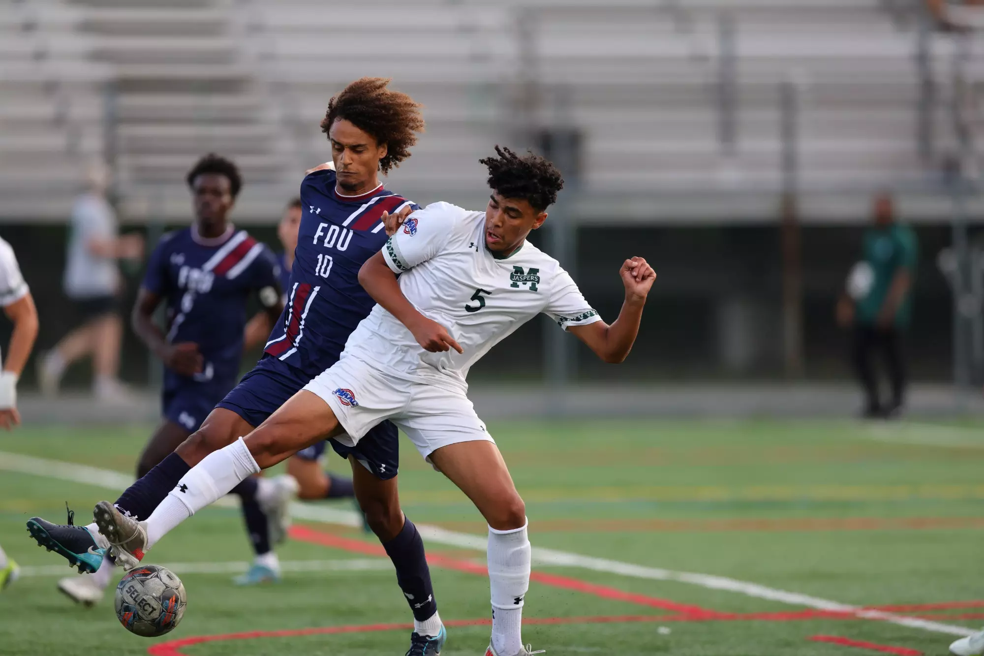 Nassim Akki playing soccer against FDU