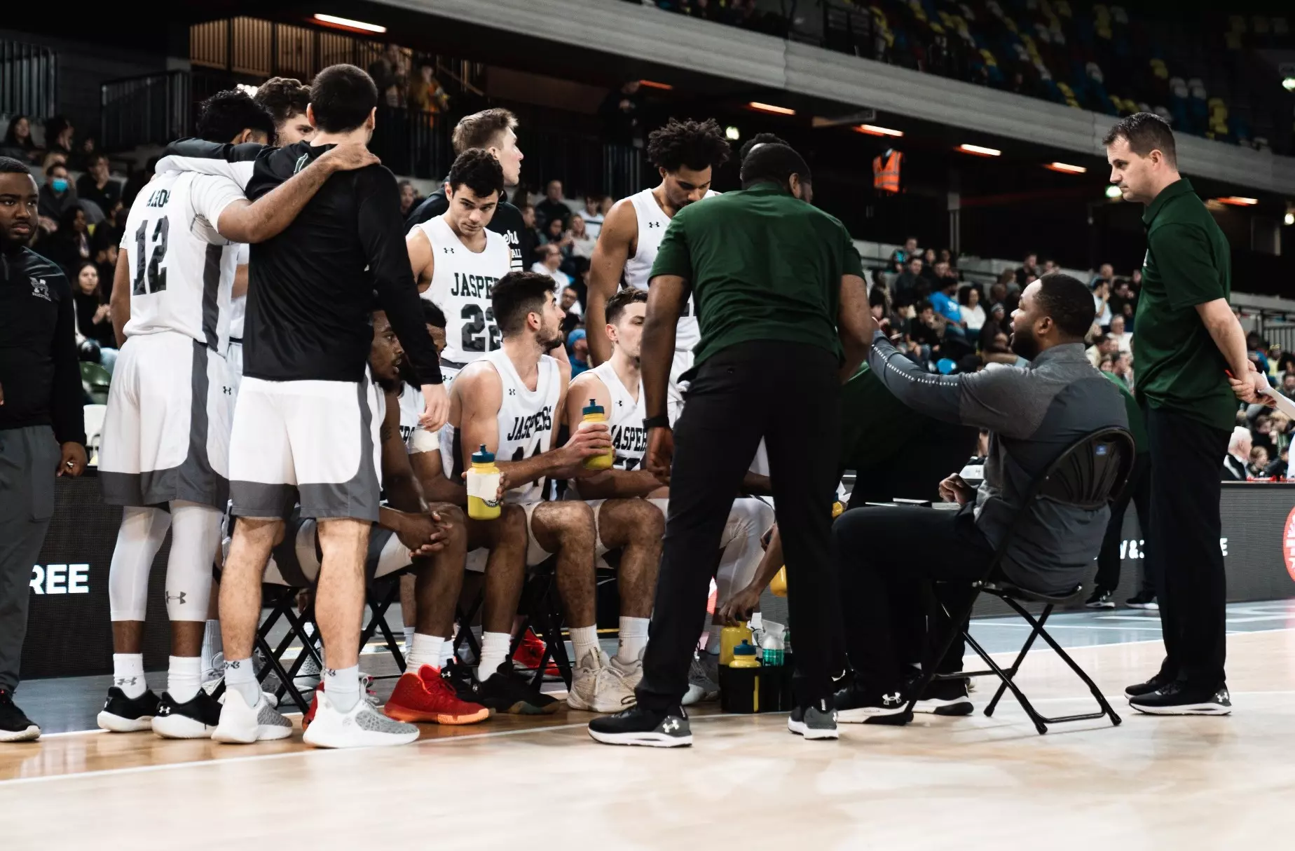 Men's basketball huddle vs Army West Point