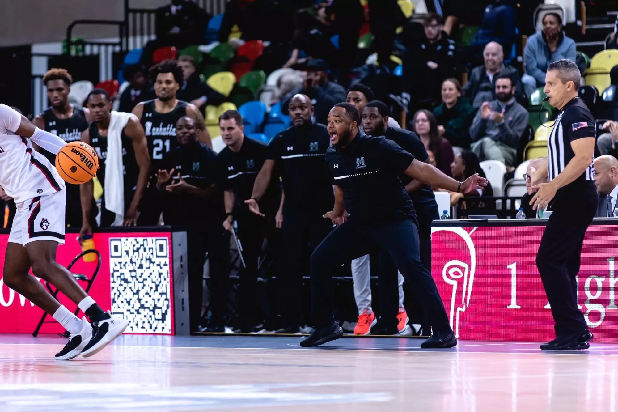 Coach Stores looks on