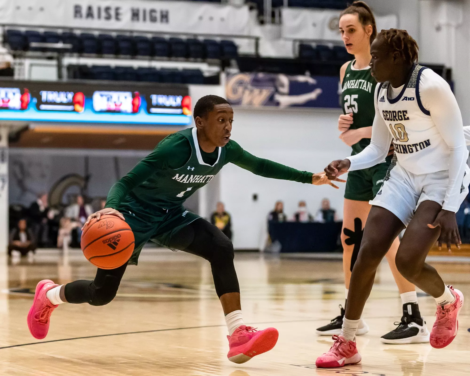 Dee Dee Davis starts a move against a GW defender 
