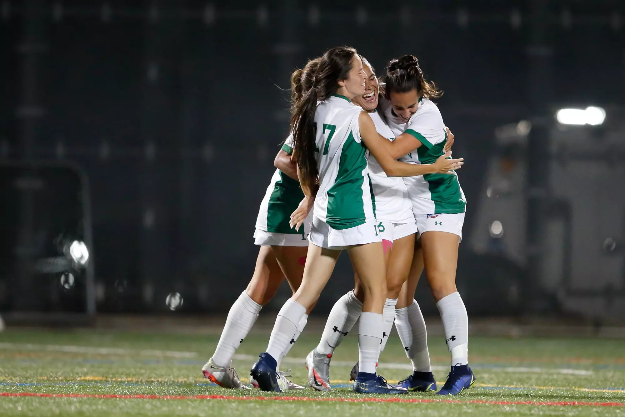 Women's Soccer celebrates goal against SFBK