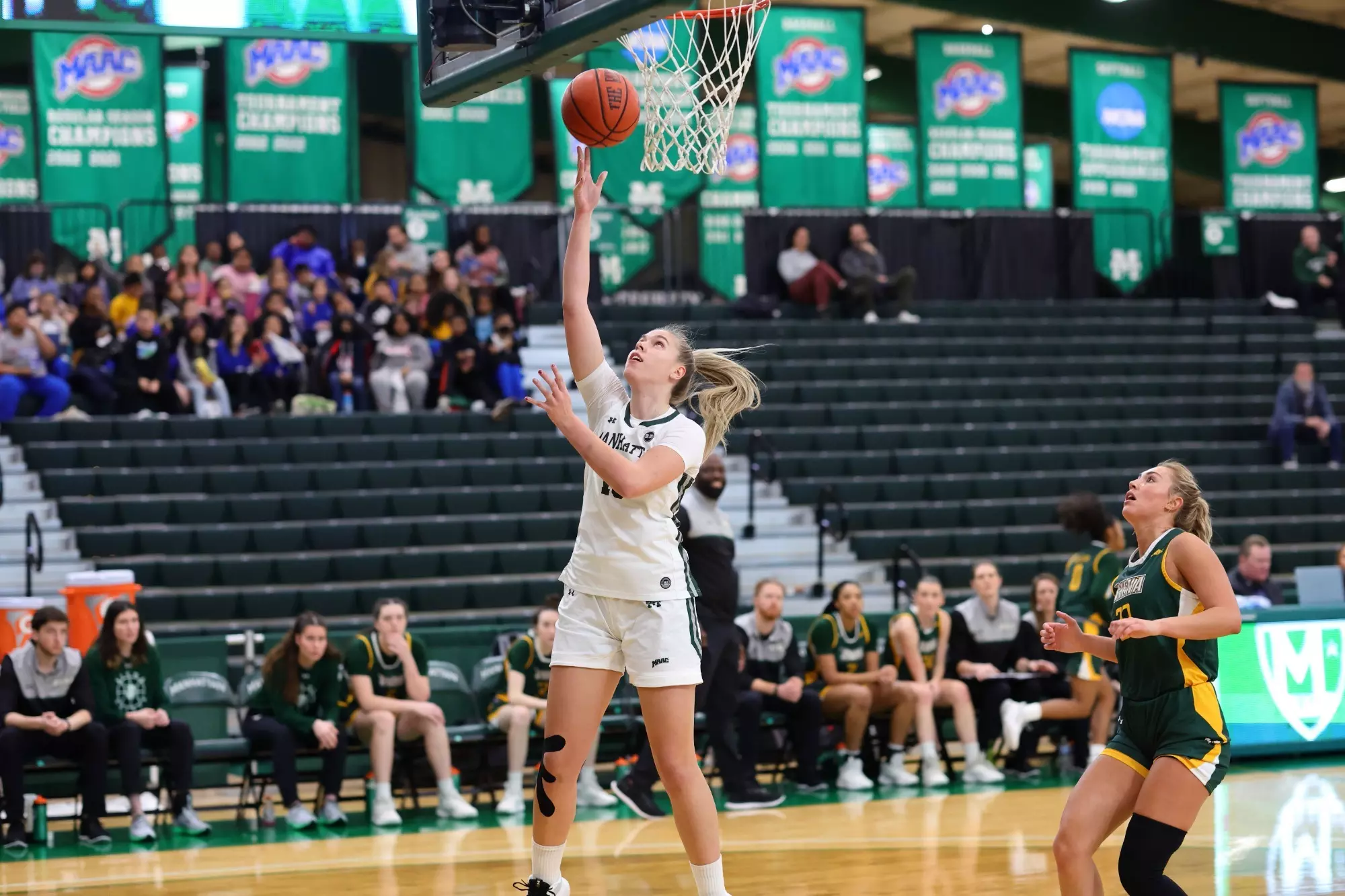 Helena Galunic goes up for a layup against Siena