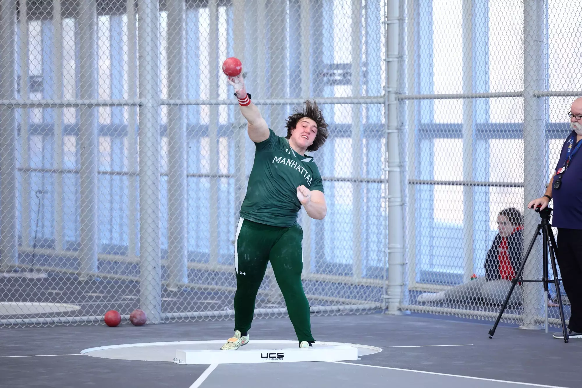 RJ Decker throws a weight
