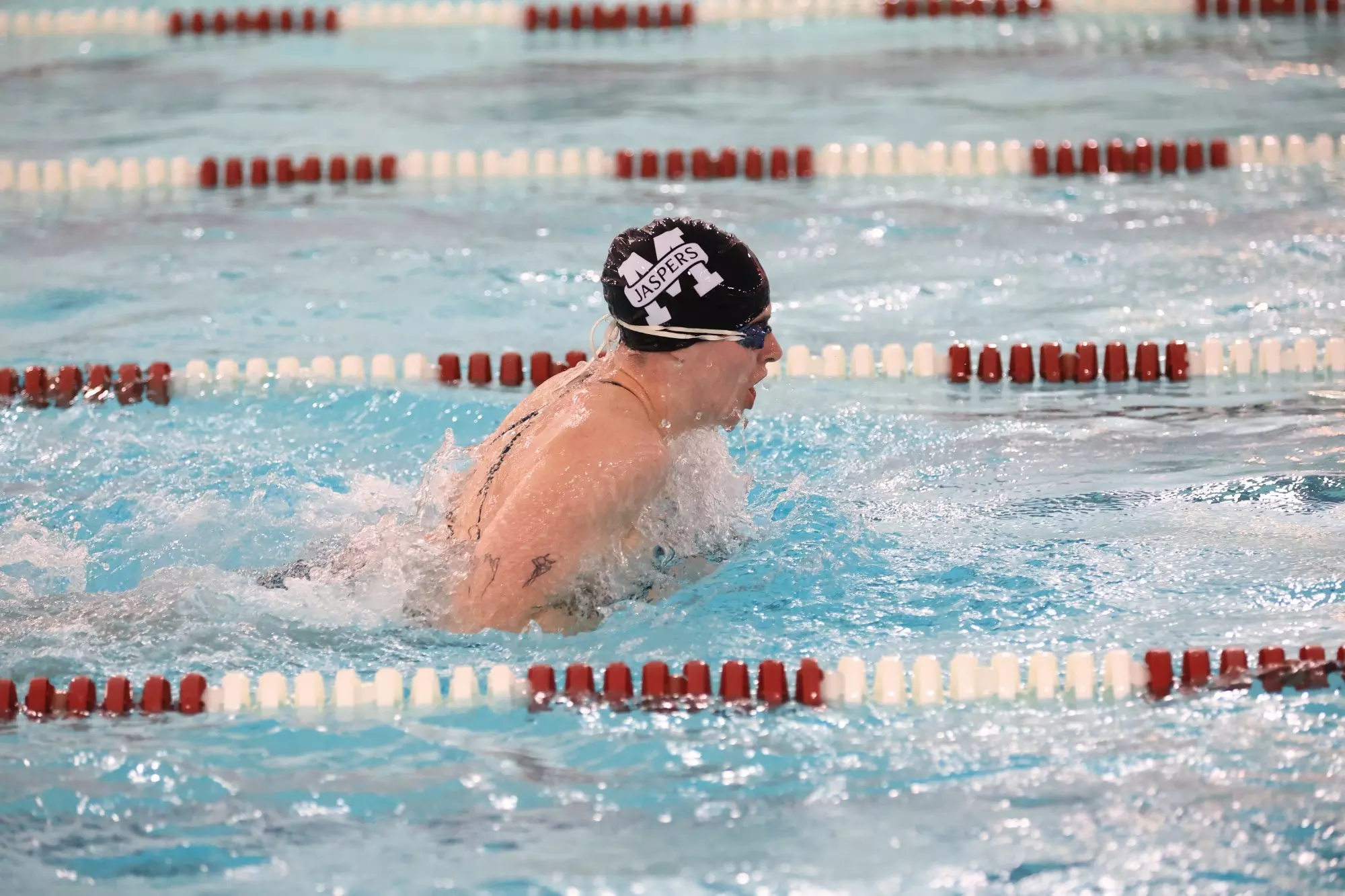 Abbey Mink swimming