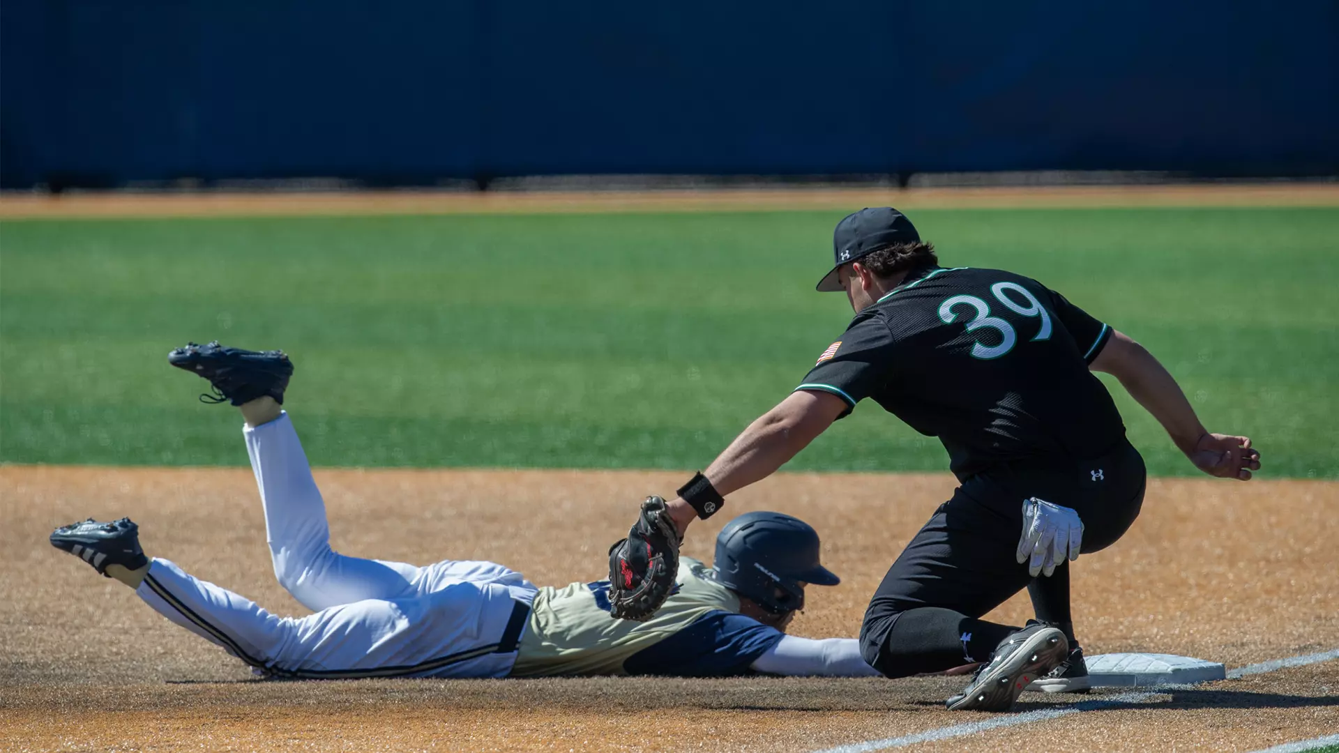 Steven Travaglini applies a tag