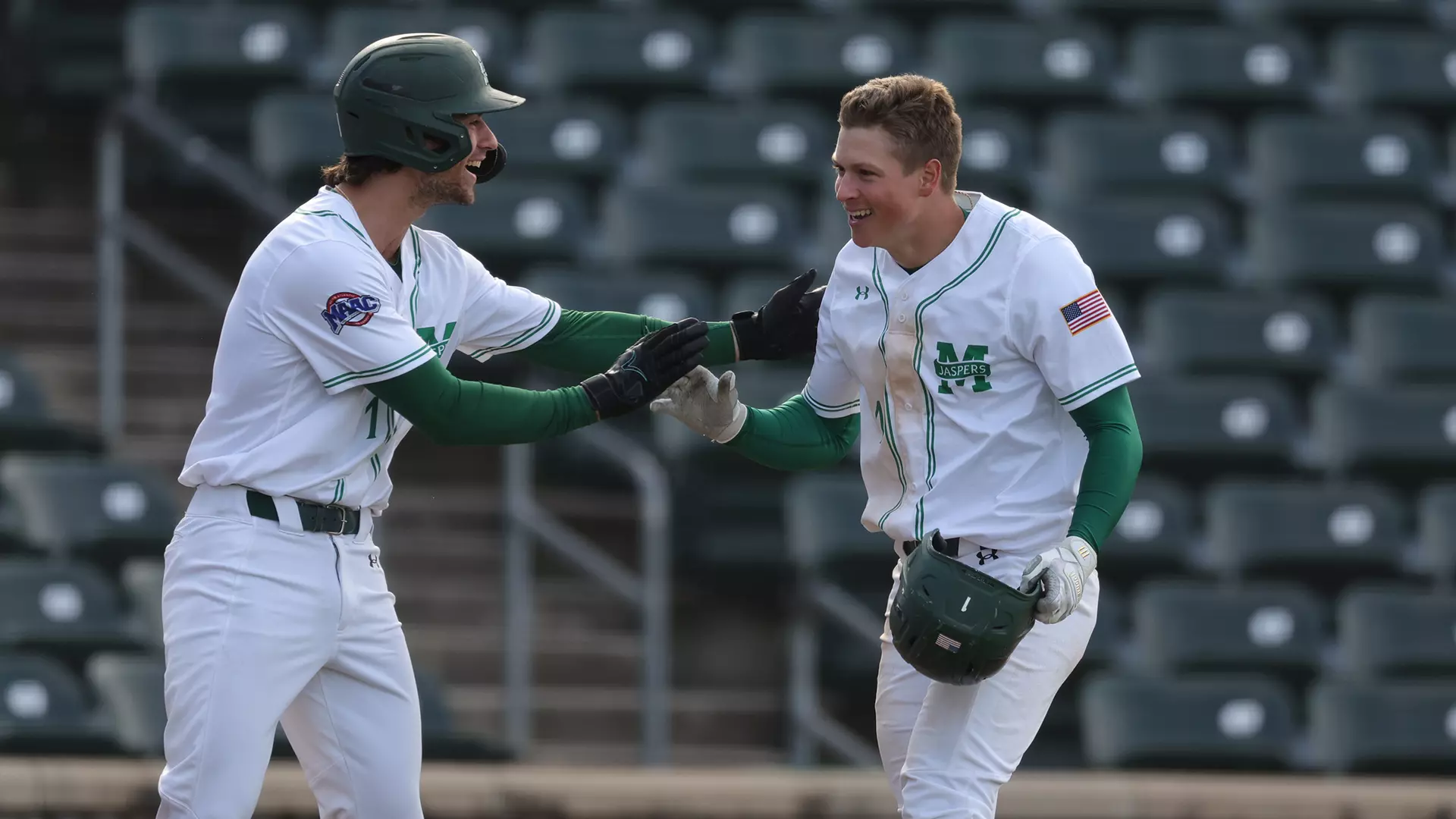 Pete Durocher and Frankie Marinelli celebrate Marinelli's home run