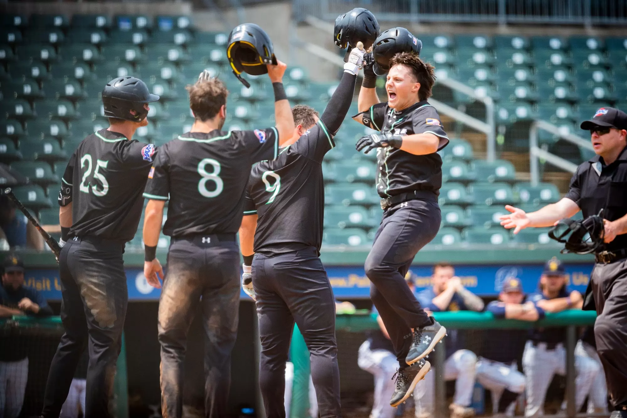 Trevor Santos celebrates his home run