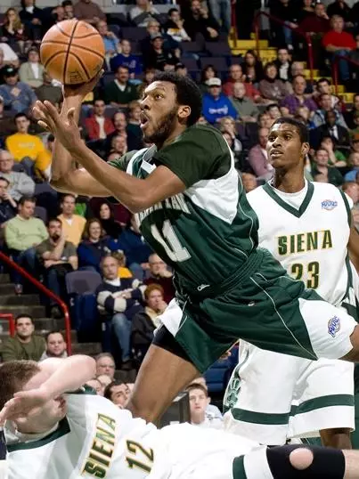 Rider Sneaks Past Manhattan; 76-73